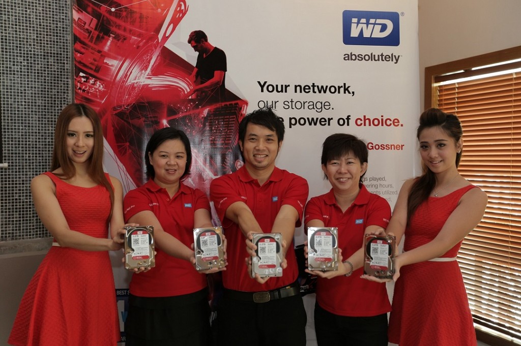 The WD Red family just got bigger! (Second from left) Wong Yen Lin, Business Senior Sales Manager, WD Malaysia, Mike Goh, Principle Field Application Engineer, WD South Asia  Region and Margaret Koh, Sales Director, Asia South, WD introducing the new range of WD Red 5TB and  6TB drives as well as the WD Red Pro.